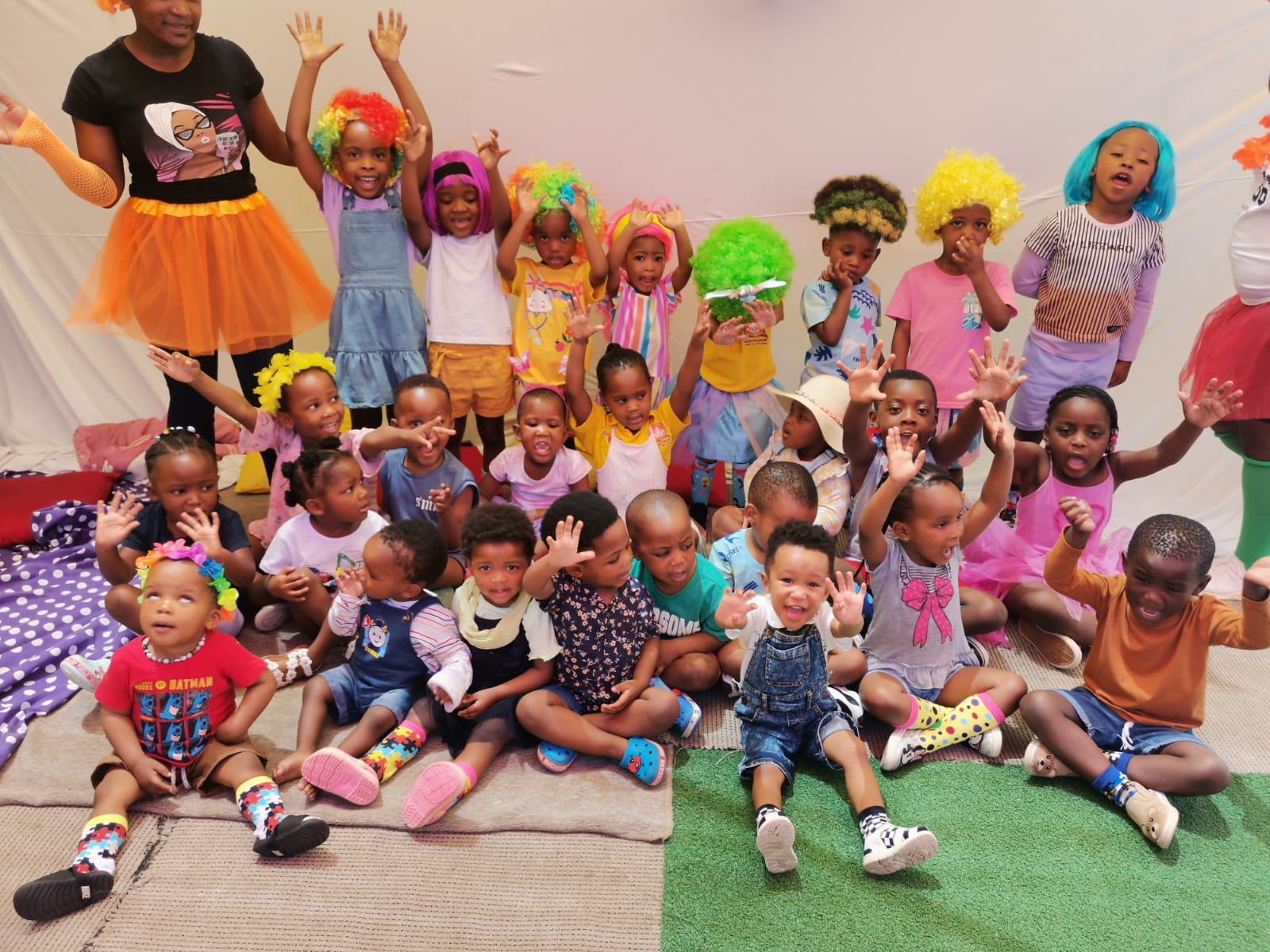 Happy child learning and reading at Little Tots